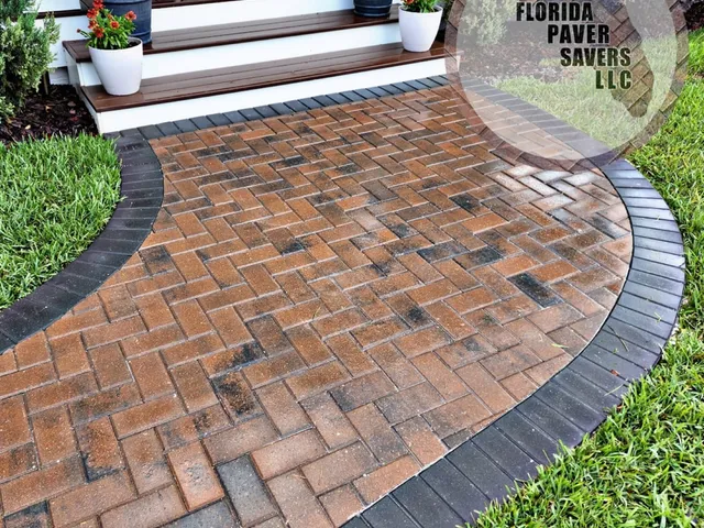 Rich brick pavers on a curved front walkway